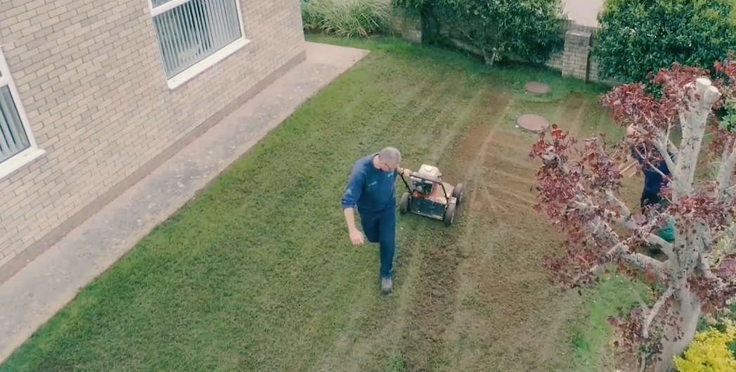 Lawn care company worker